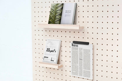 Wooden chair rail for Pegboard and book display