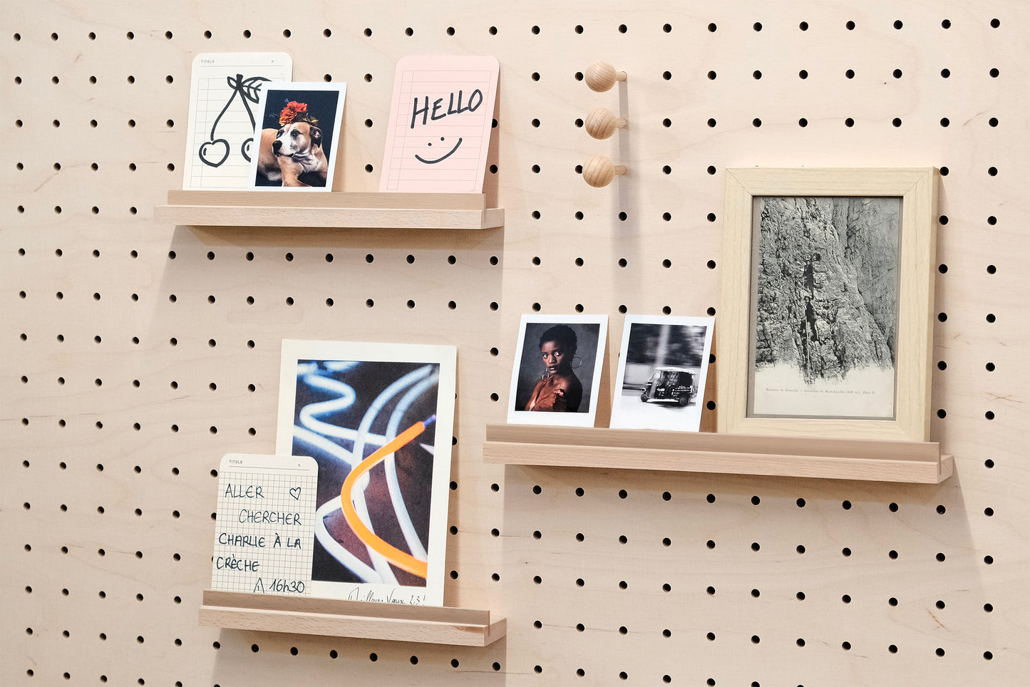 Wooden chair rail for Pegboard and book display