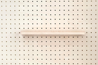 Wooden chair rail for Pegboard and book display