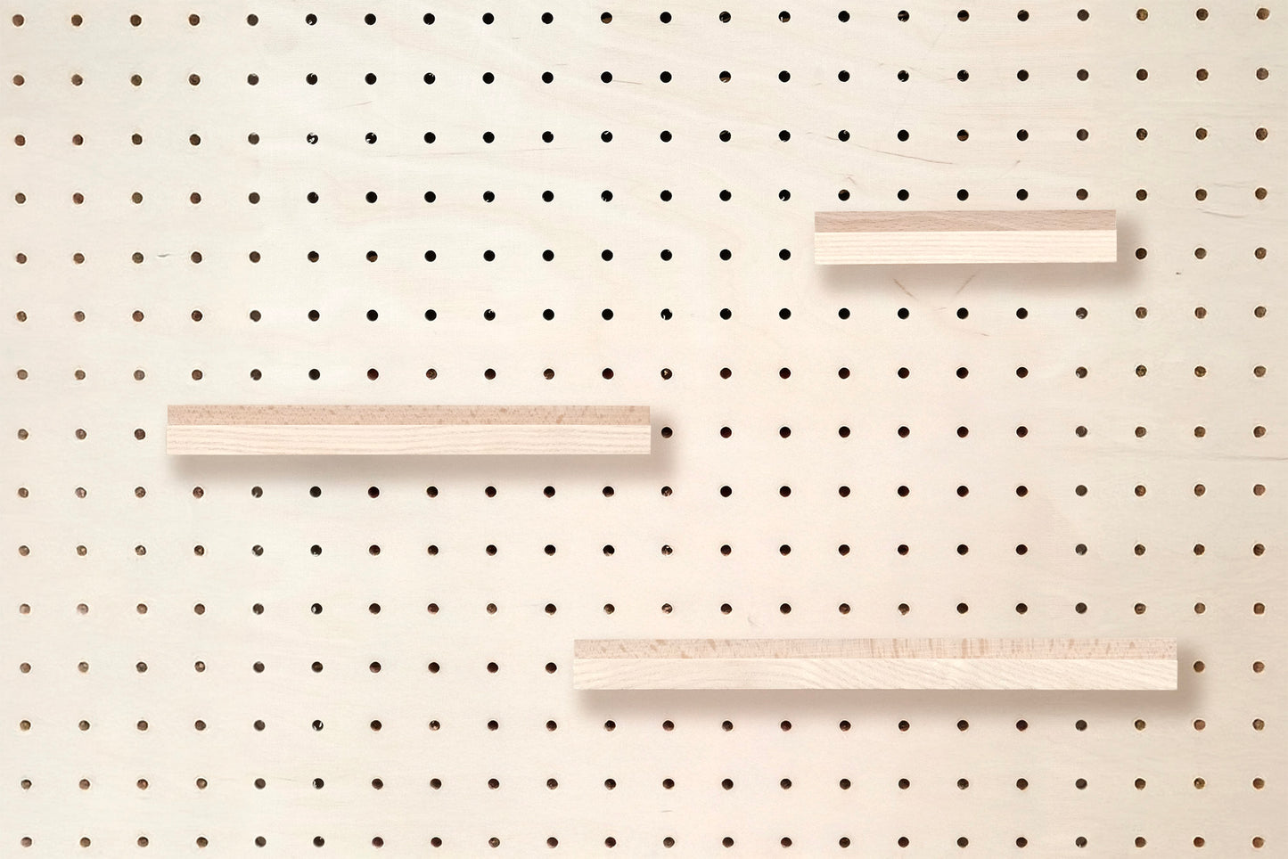 Wooden chair rail for Pegboard and book display